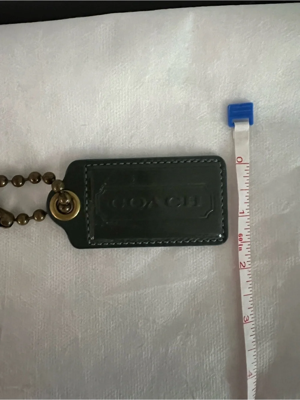 Coach Dark Green Patent Leather Hangtag